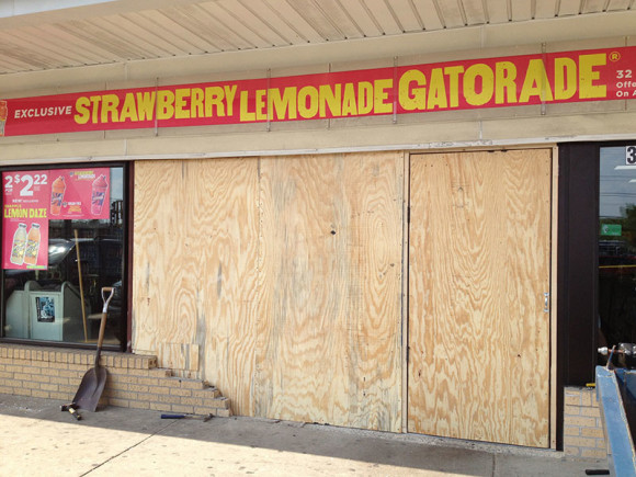 Storefront in Joliet, IL That Has Been Boarded Up After a Disaster