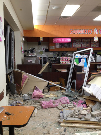 Before debris cleanup inside of a Munster, IN Dunkin Donuts